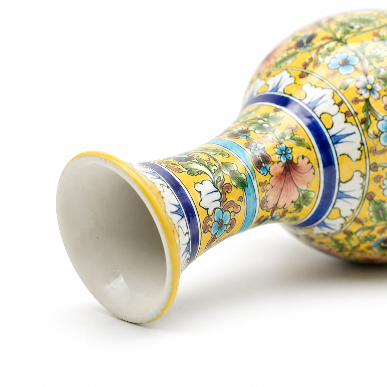 Close-up of handcrafted Jaipur Blue Pottery Vase with floral artwork